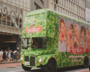 green bus near building